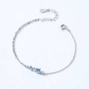 Elegant S925 sterling silver chain bracelet with blue round gems and white zircon stones
