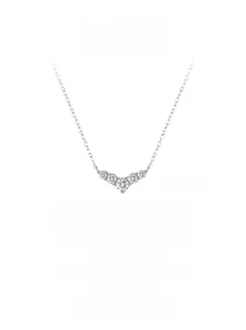 Macro view of S925 silver V-shaped pendant necklace with sparkling cubic zirconia stones