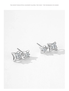 Macro view of S925 sterling silver four-pointed star earrings with sparkling zircon