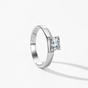 Minimalist S925 silver ring featuring emerald cut cubic zirconia in a sleek tension setting