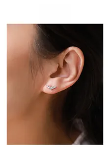 Model display of silver V-shaped stud earrings with sparkling pavé cubic zirconia