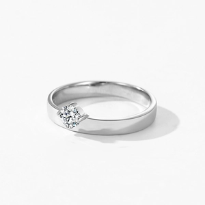 Polished S925 sterling silver ring with a sparkling round diamond in a four-prong setting