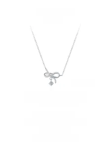 Close-up of S925 sterling silver bow pendant necklace featuring sparkling cubic zirconia