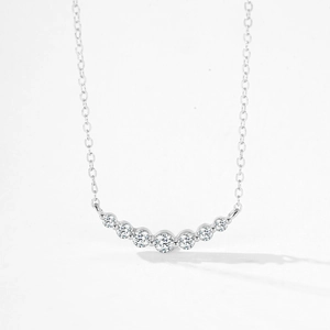 Elegant S925 sterling silver curved smile necklace with shimmering zircon stones