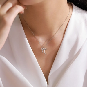Elegant S925 sterling silver bow necklace with sparkling zircon pavé for women