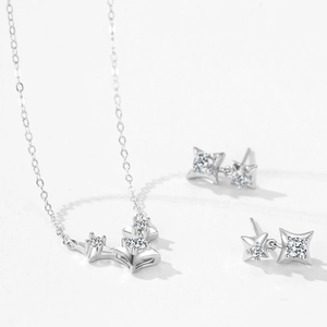 Elegant S925 sterling silver starburst necklace and earrings set with sparkling crystals