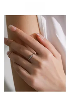 Detailed view of S925 silver ring featuring a pink zircon and side accent stones