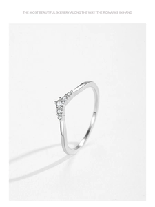Close-up of S925 sterling silver V-shaped ring with five brilliant round zircons
