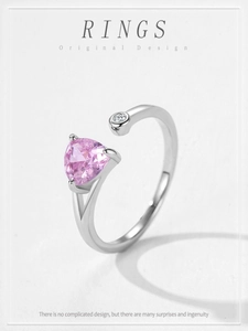 Close-up of S925 silver adjustable ring with a pink triangle gemstone and a small diamond