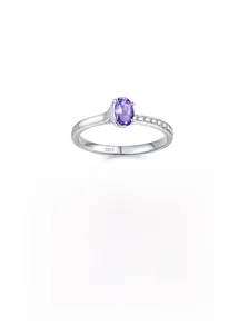Macro shot of S925 sterling silver ring with oval purple gemstone and textured band detail