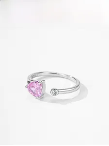 Detail of S925 silver ring featuring a large pink triangle stone and S925 hallmark