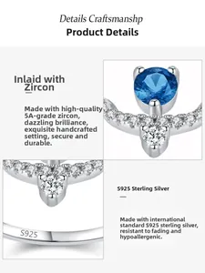 Macro detail of S925 sterling silver ring with blue zircon and S925 hallmark