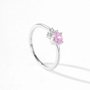 S925 sterling silver ring featuring a pink round cubic zirconia and side stones