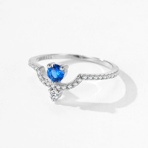 Vintage S925 sterling silver ring with V-shaped pavé band and blue round zircon center