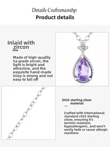 Macro detail of S925 sterling silver chain and teardrop purple zircon pendant