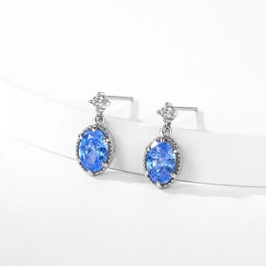 Boucles d'oreilles pendantes en argent S925 avec zircons ovales bleu profond sertis