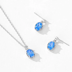 Parure de bijoux en argent S925 avec pierres bleues ovales et détails en diamant