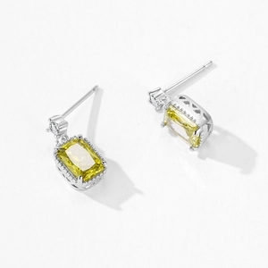 S925 silver stud earrings with yellow rectangular zircon and hollow heart side detail