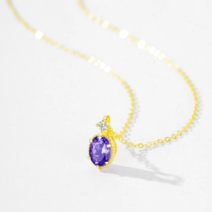 Elegant 14K gold-plated S925 silver necklace with oval purple crystal pendant and zircon