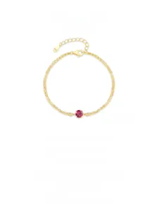 Close-up of S925 sterling silver gold bracelet with round red zircon and material hallmark
