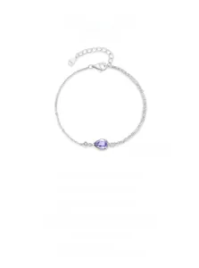 Detail of S925 sterling silver bracelet with pear-cut purple zircon and fine metal bead border