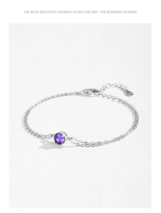 Detailed close-up of S925 sterling silver bracelet with purple round zircon and double chain