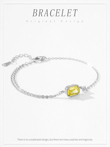 Detailed macro view of S925 sterling silver bracelet with yellow square zircon stone