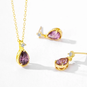 Parure élégante en argent S925 avec pendentifs goutte d'eau violets et fini doré