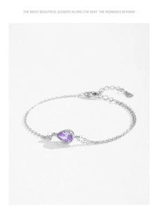 Macro detail of S925 sterling silver lobster clasp and purple teardrop zircon bracelet