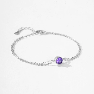 Elegant S925 sterling silver chain bracelet with a round purple crystal and lobster clasp
