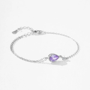 Elegant S925 sterling silver bracelet with pear-shaped purple zircon and small white stone