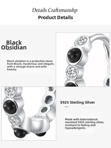 Macro view of S925 sterling silver hoop earrings with black obsidian and clear zircon