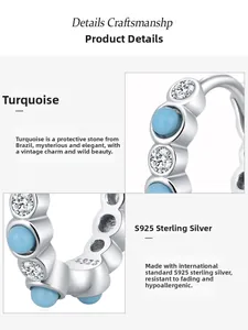Gros plan du poinçon S925 en argent sterling avec détails en turquoise et zircon