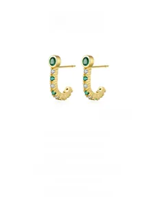 Detailed macro view of S925 sterling silver gold earrings with green zircon stones
