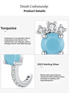 Macro detail of S925 sterling silver J-shaped stud with turquoise and white zirconia