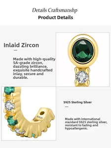 Macro shot of S925 sterling silver gold-plated stud with green zircon and S925 hallmark