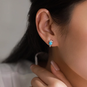 Elegant S925 sterling silver stud earrings featuring turquoise stone and sparkling zircons