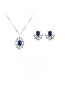 Detail view of S925 sterling silver sunflower necklace and earrings set with blue sapphire
