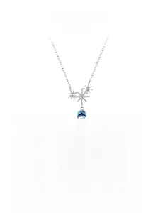 Detailed view of 925 sterling silver star pendant with a faceted oval blue zircon stone