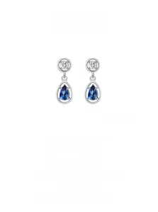 Macro shot of S925 silver earrings with blue teardrop gemstone and white crystal stud