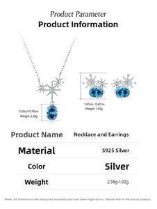 Macro detail of 925 silver necklace and earring set with sapphire blue oval gemstones
