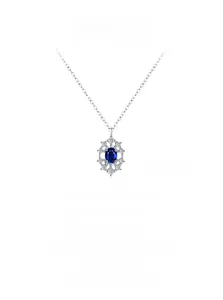 Detailed macro view of 925 sterling silver sapphire pendant necklace with white diamonds