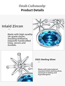 Macro d'une boucle d'oreille étoile en argent 925 avec zircon bleu ovale serti à la main