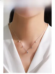 S925 sterling silver necklace with blue moonstones and zircon pendants on model