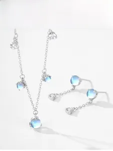 Detail view of S925 sterling silver necklace and earrings set with moonstone and zircon