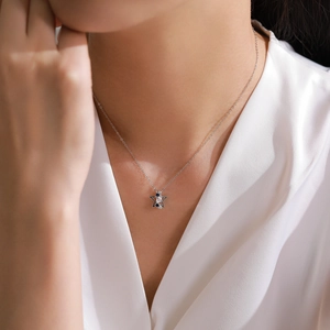 S925 sterling silver star necklace with blue zircon pendant worn by female model