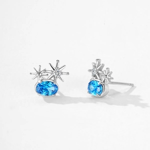 Boucles d'oreilles en argent 925 avec étoile solaire et pierres de zircone bleu