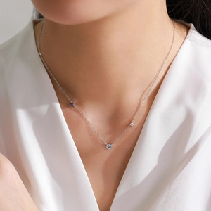 Elegant S925 sterling silver necklace featuring moonstone and colorful zircons on a model
