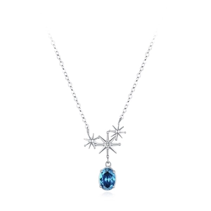 Sterling silver necklace with star pendants and oval blue zircon on white background