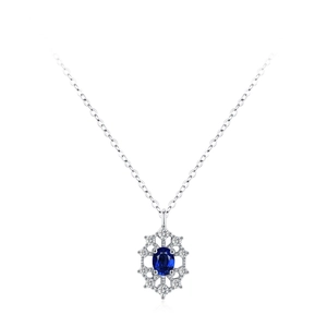 Elegant 925 sterling silver necklace with oval sapphire pendant and halo of crystals